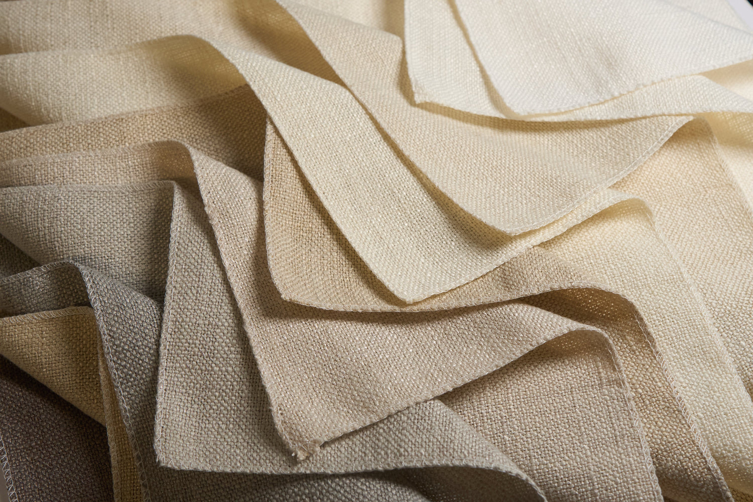Close-up view of soft, textured fabric showcasing a variety of shades for NEW PRODUCTS.